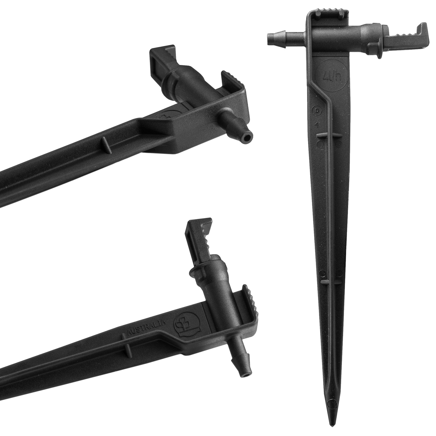 Set of black dripper emitters on spikes with barbed hose connections
