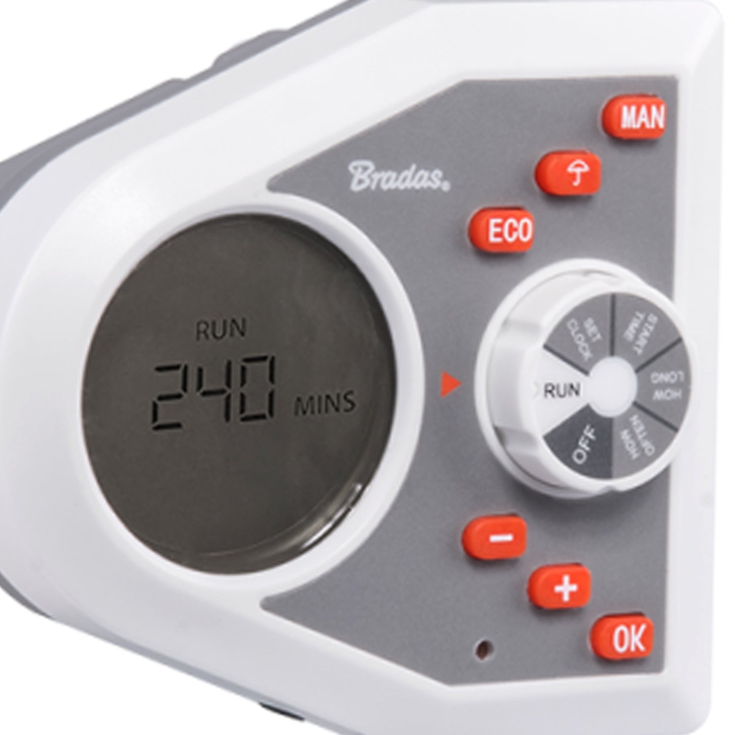 Close-up: white electronic water timer face with RUN minutes display and orange buttons
