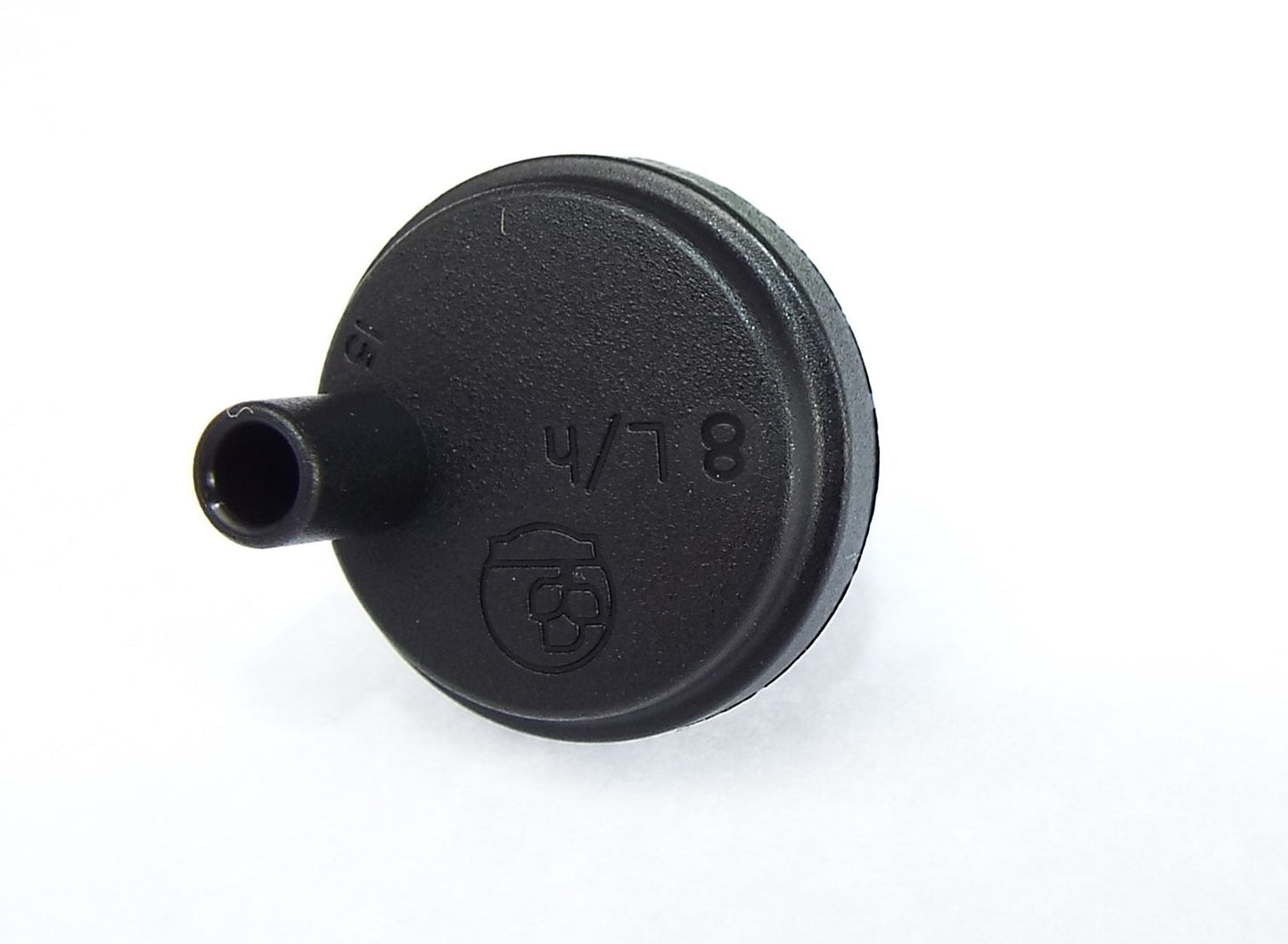 Black dripper end view with marked cap and side inlet barb opening
