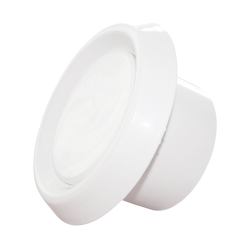 White ABS extract ceiling valve, angled close-up of round cover and rim