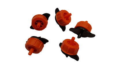 Five Turbo Dripper non-pressure compensating outlets, orange with black mounting legs