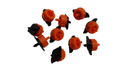 Assorted Turbo Dripper outlets showing orange caps and black insert screens