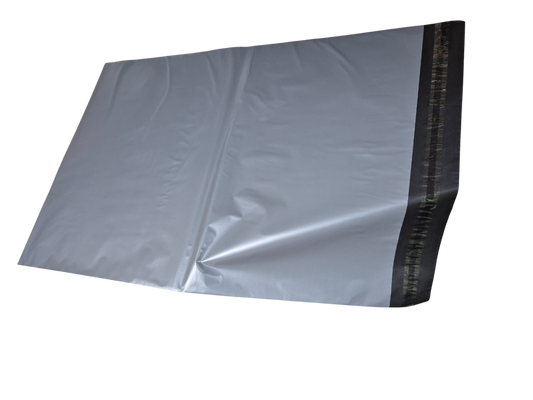 Gray poly mailing bag with black self-seal strip, partially opened