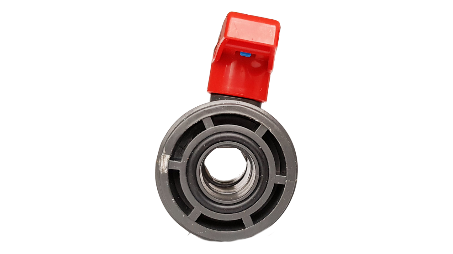 PVC stopcock end view showing circular port opening and red lever housing