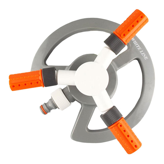 3-arm revolving sprinkler, orange nozzles on white arms, gray circular base