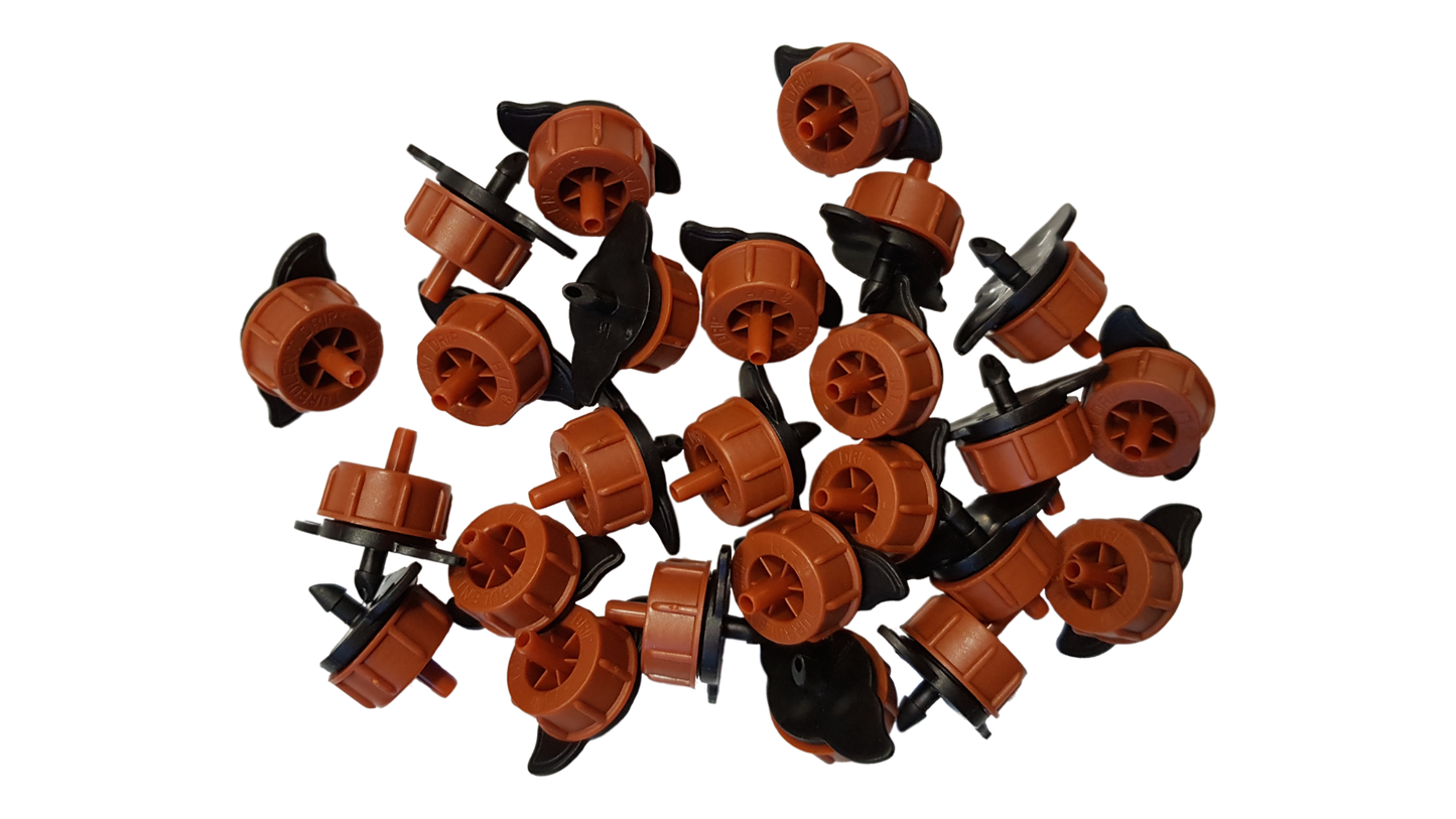 Pack of orange non-pressure-compensating drippers with black spikes