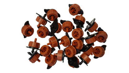 Pack of orange non-pressure-compensating drippers with black spikes