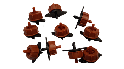 Bulk set of orange non-pressure drippers with black caps and stakes