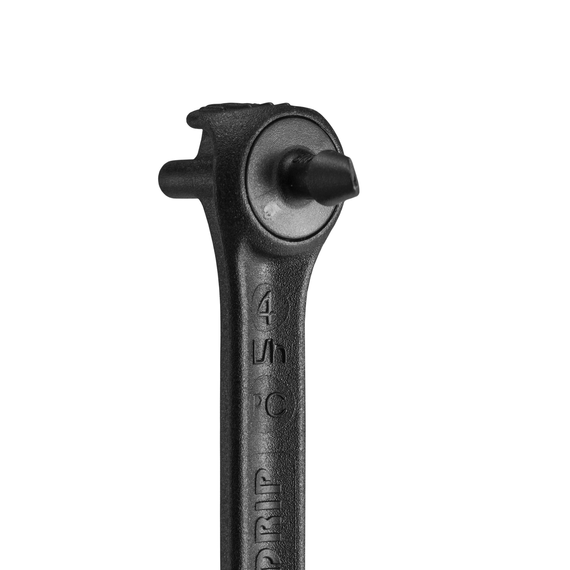 Close-up of black spike dripper outlet head and insertion nozzle