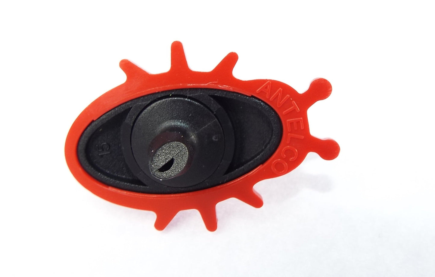 Ladybug dripper underside cover, black circular insert on red body