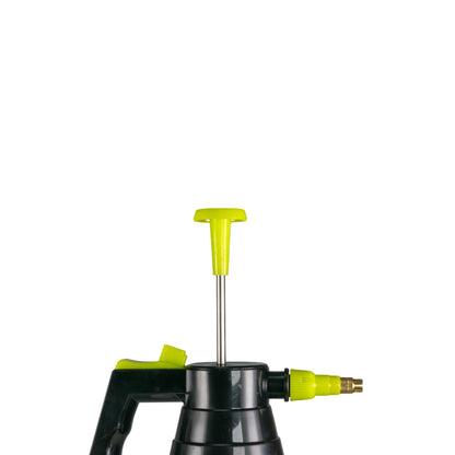 Pump sprayer top view: lime cap, vertical riser tube, and green nozzle