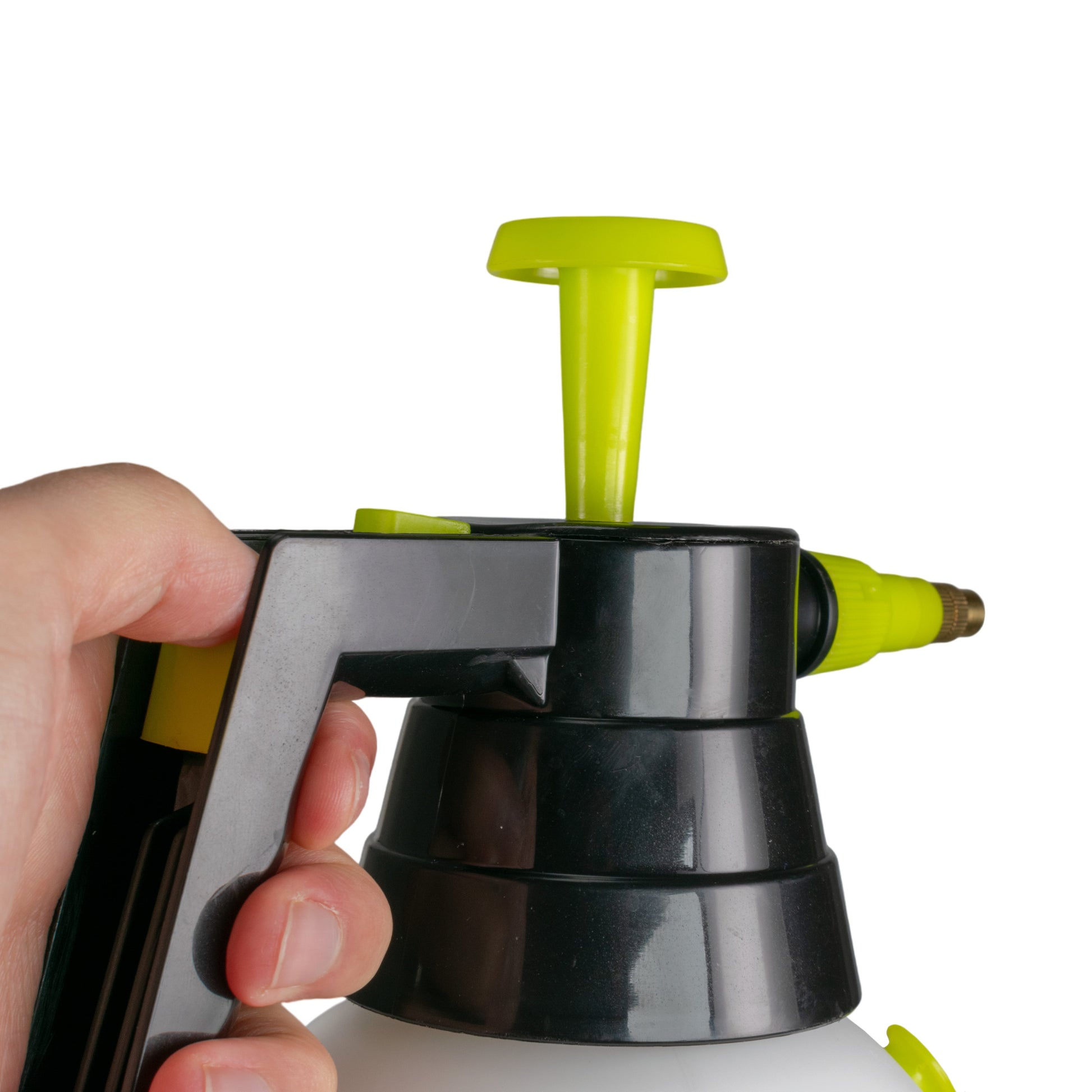 Close-up of fingers pressing the black pump handle under the lime nozzle