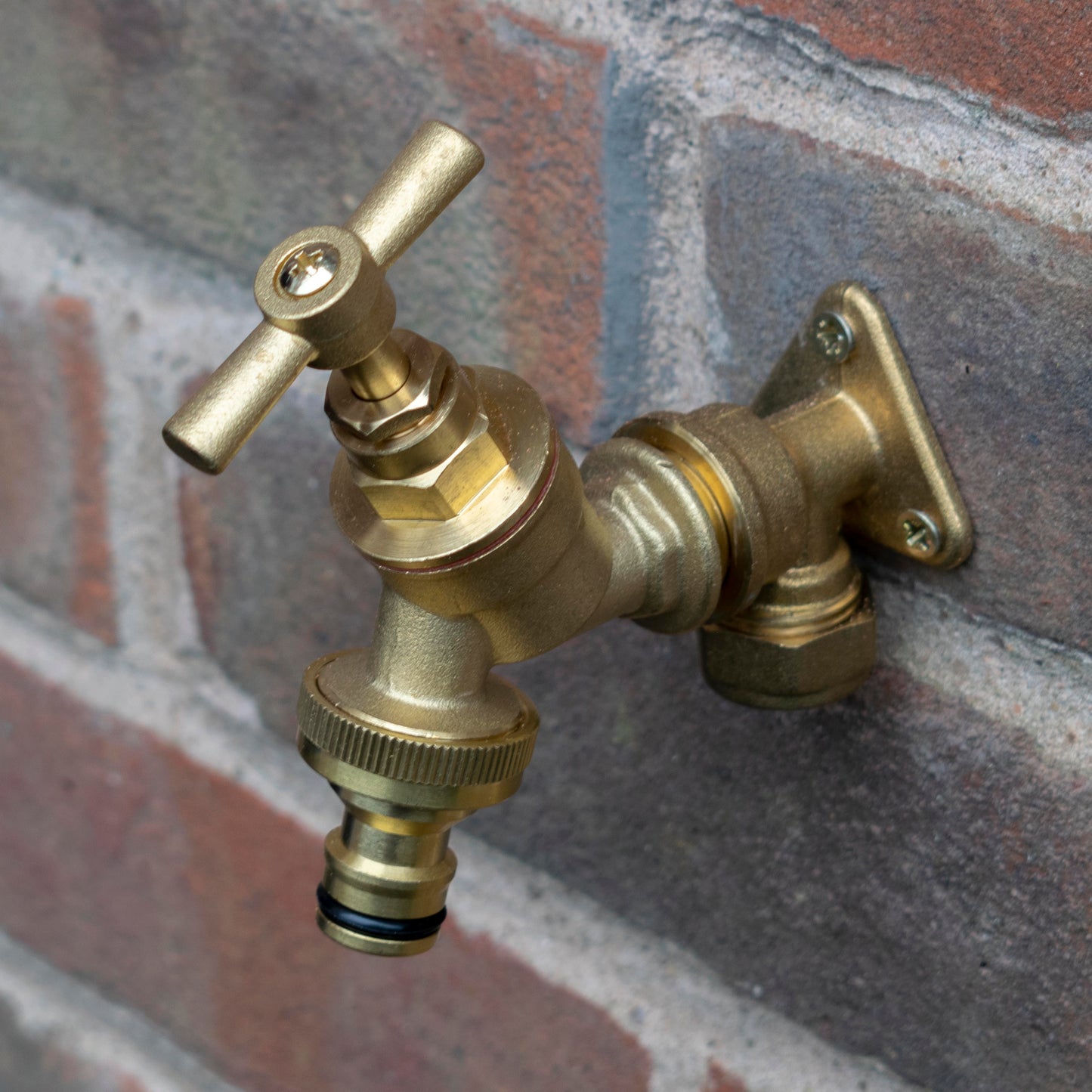 Brass quick-connect wall tap valve with threaded connections and lever handle