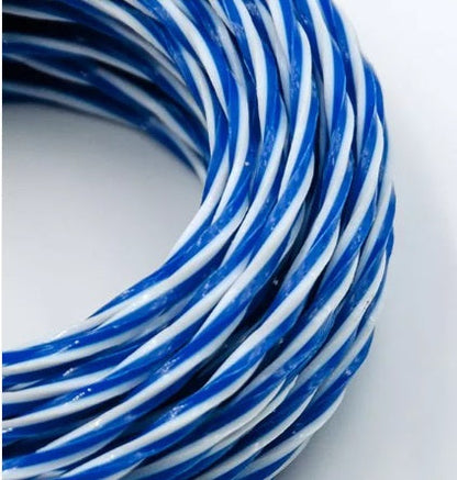 Close-up of striped blue and white trimmer line cord