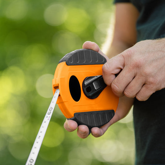 Coiled tape measure, 13 mm, orange/black reel with 20 m tape
