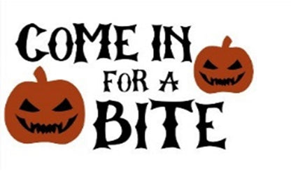 Close-up doormat: 'Come in for a Bite' with black lettering and orange pumpkins