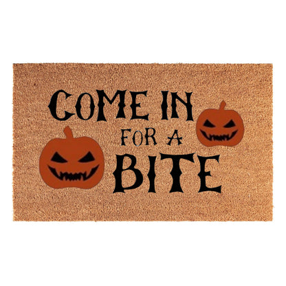 Doormat 60x40cm with 'Come in for a Bite' text and orange jack-o'-lanterns
