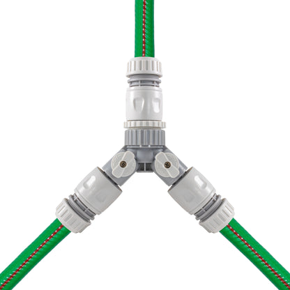 Top view of 3-way valved mixer joining two green hoses to central outlet