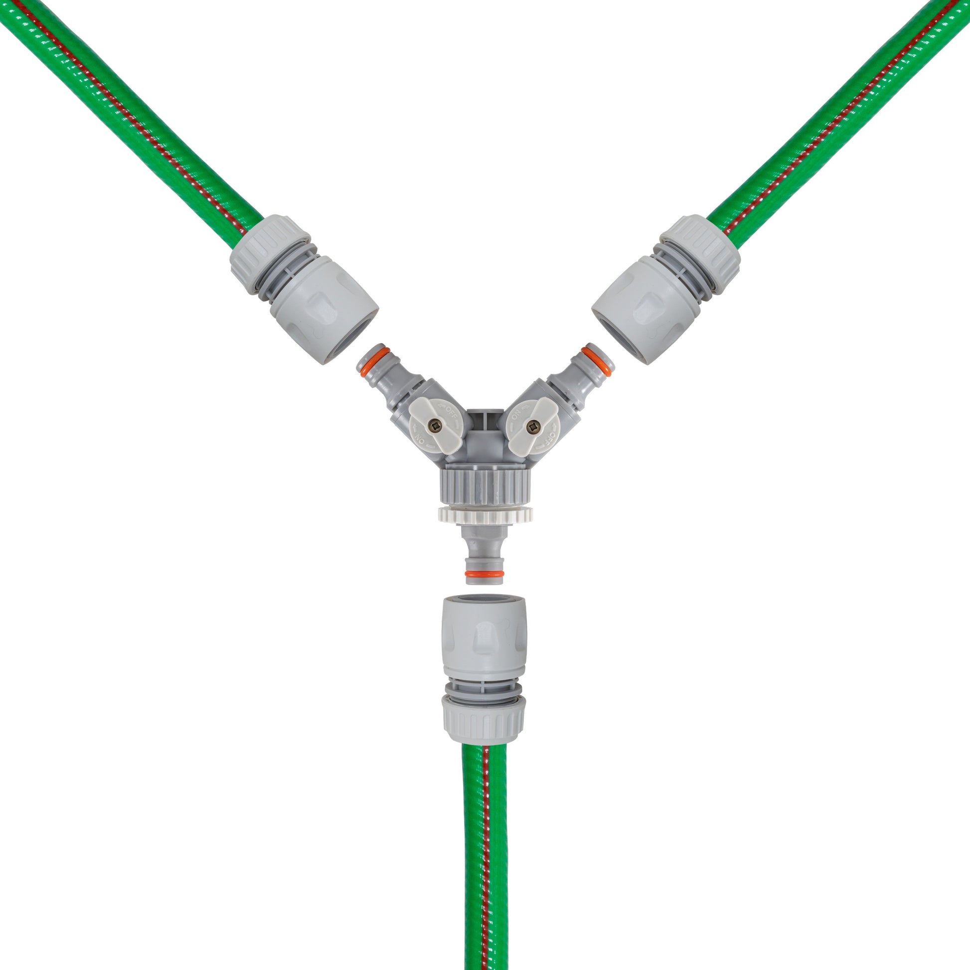 Close-up of 3-way valved mixer with green hoses and central outlet
