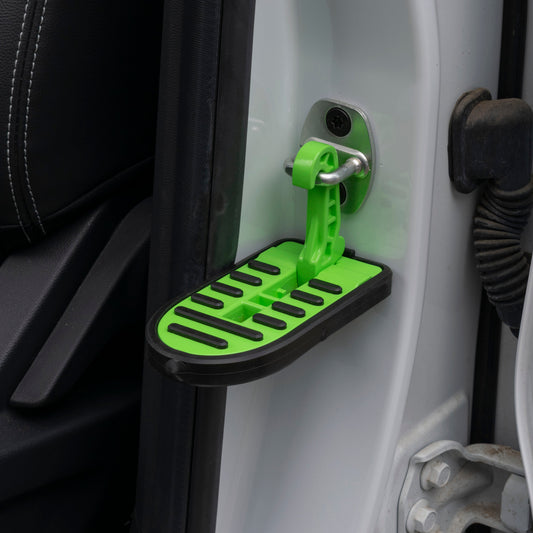 Car Door Step Type C in green and black, mounted at the vehicle door sill
