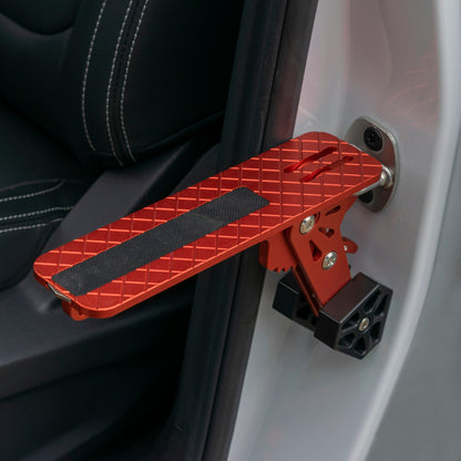 Orange folding car door step with black anti-slip strip and ridged grid tread