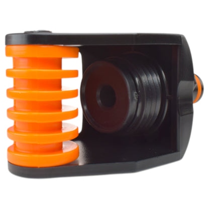 Tap adapter connection with orange spring collar and black threaded connector.