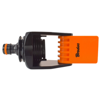 Side view of black tap adapter with orange top grille and connector thread.