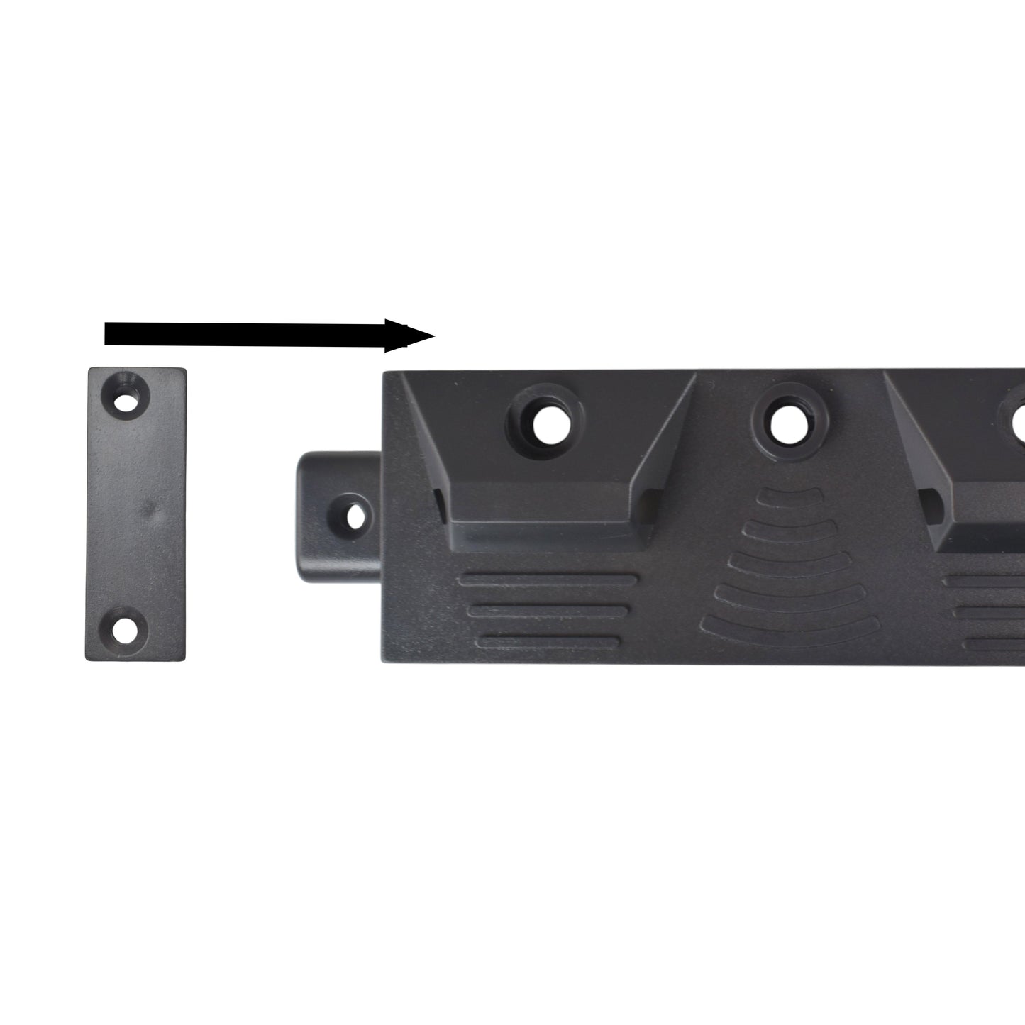 Close-up of black tool rail mounting plate with screw holes