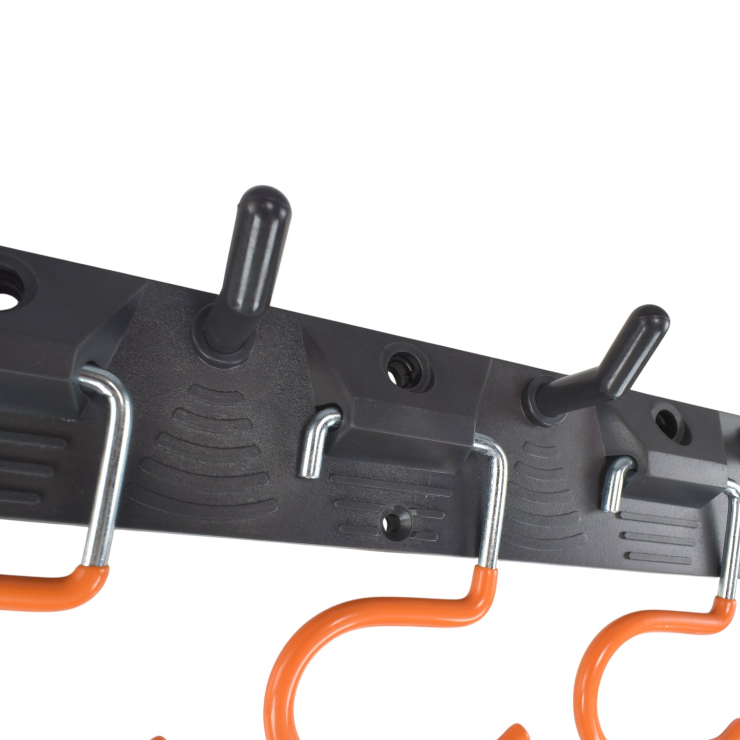 Adjustable peg hooks on black tool rail with orange hook parts