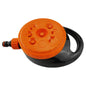 Orange-and-black static lawn sprinkler with patterned spray nozzles on the top dial