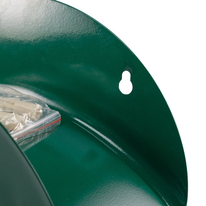 Green metal hose hanger close-up of curved cradle and white mounting-hole marker