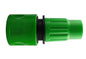Green expanding garden hose connector with black ring and ridged end sleeve