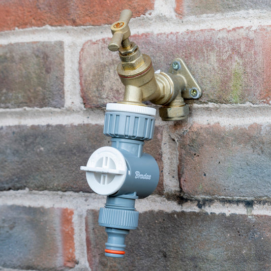 Garden tap filter with blue housing and brass control valve fittings