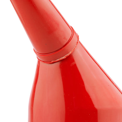 Red angled fuel funnel with filter, close-up of rim and spout joint
