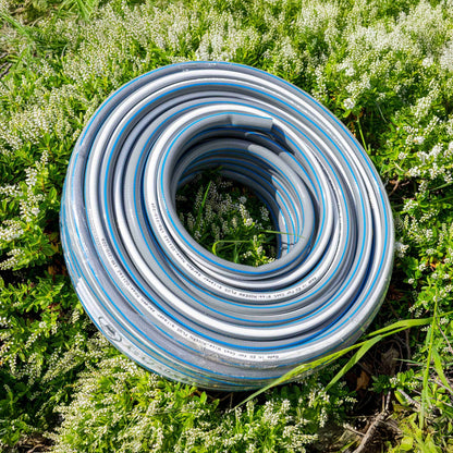 Cold water hose, grey with blue stripes, coiled