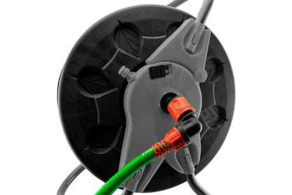 Orange and black angle hose connector with lock, shown mounted on reel