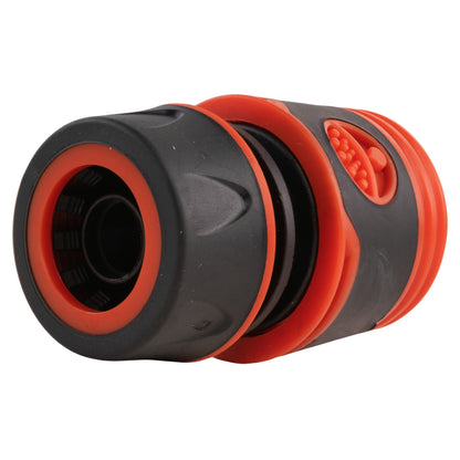 End view of quick-connect connector: black housing with orange collar and textured insert