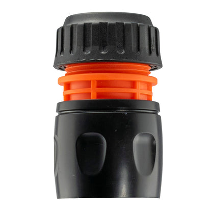 Black hose connector housing close-up showing orange latch ring