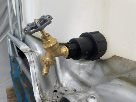 Brass IBC tap extender adaptor with round black handle and 1/2in barbed outlet