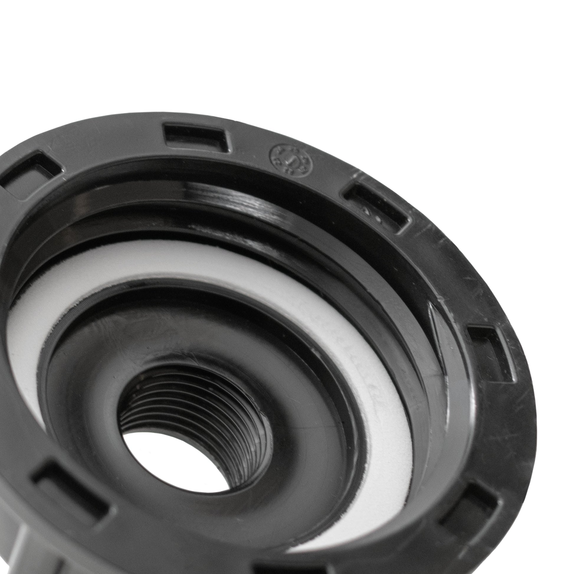 Close-up of IBC cap insert with internal thread and circular opening