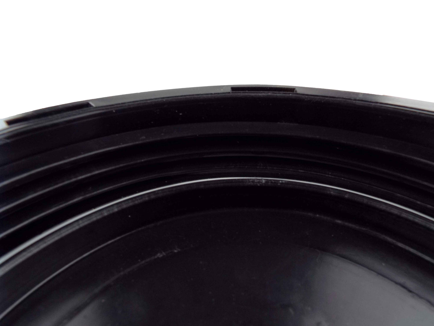 Close-up of black rim and sealing grooves on IBC tank blanking lid
