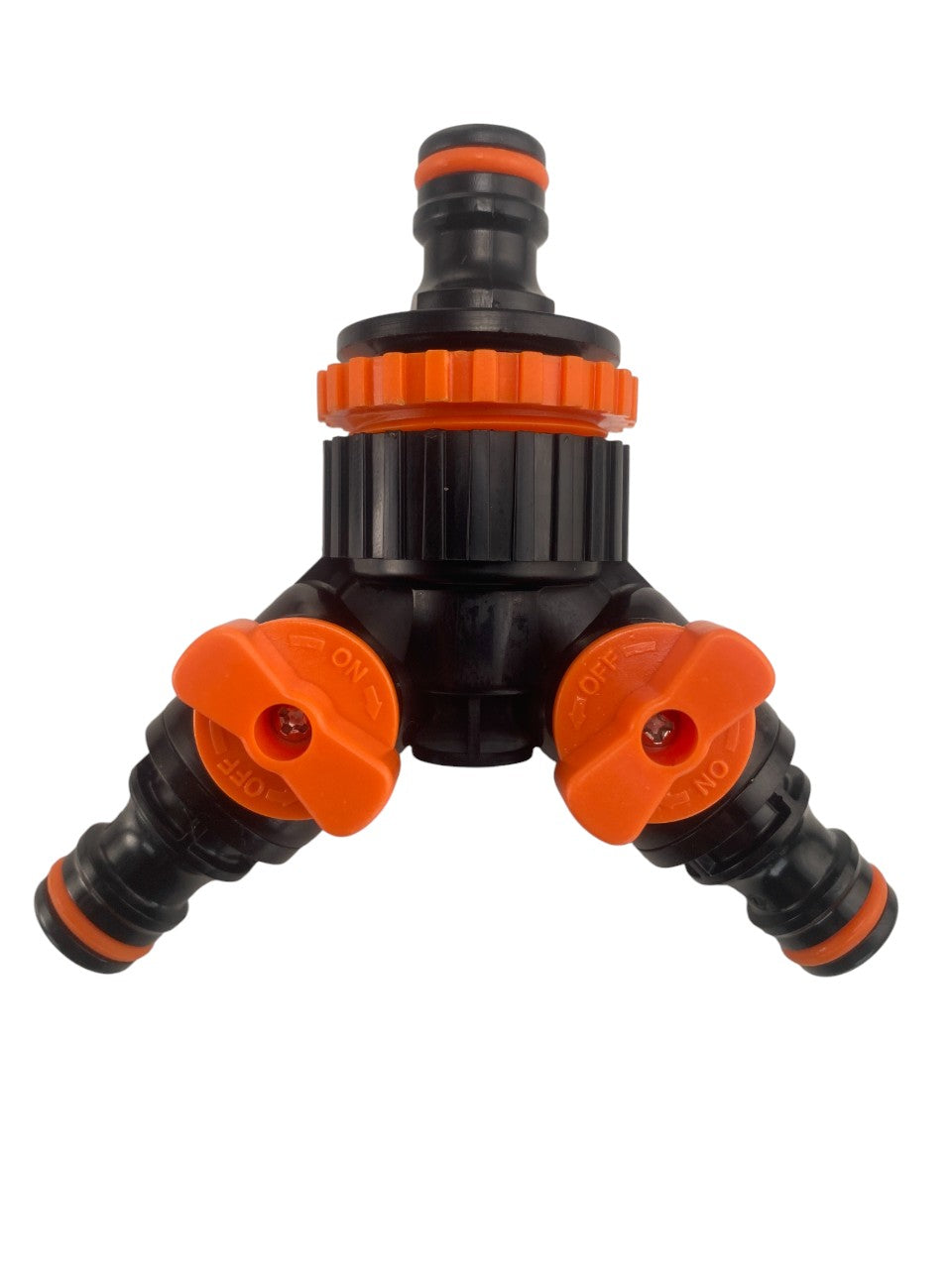 Close-up of 3-way connector valve ports, orange switches on black manifold