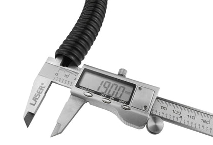 Caliper measuring 3/4" (19mm) corrugated pipe diameter; black ribbed hose.