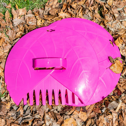 Pink leaf grab garden scoop head with leaf-grabbing spikes for clearing debris