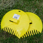 Yellow leaf grabber garden scoop with comb-like rake teeth and central handle