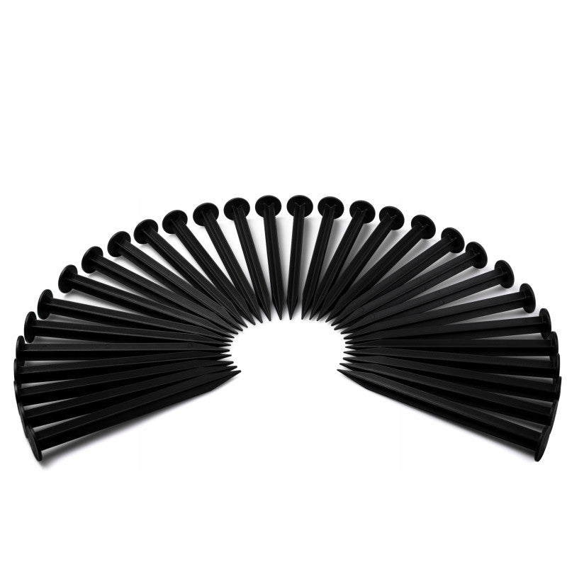 Black lawn border peg set fanned out, pointed stakes with round heads
