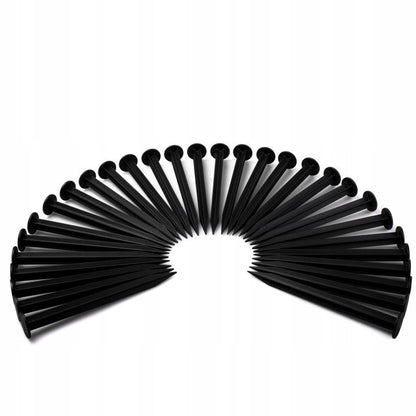 Black lawn border peg set fanned out, pointed stakes with round heads