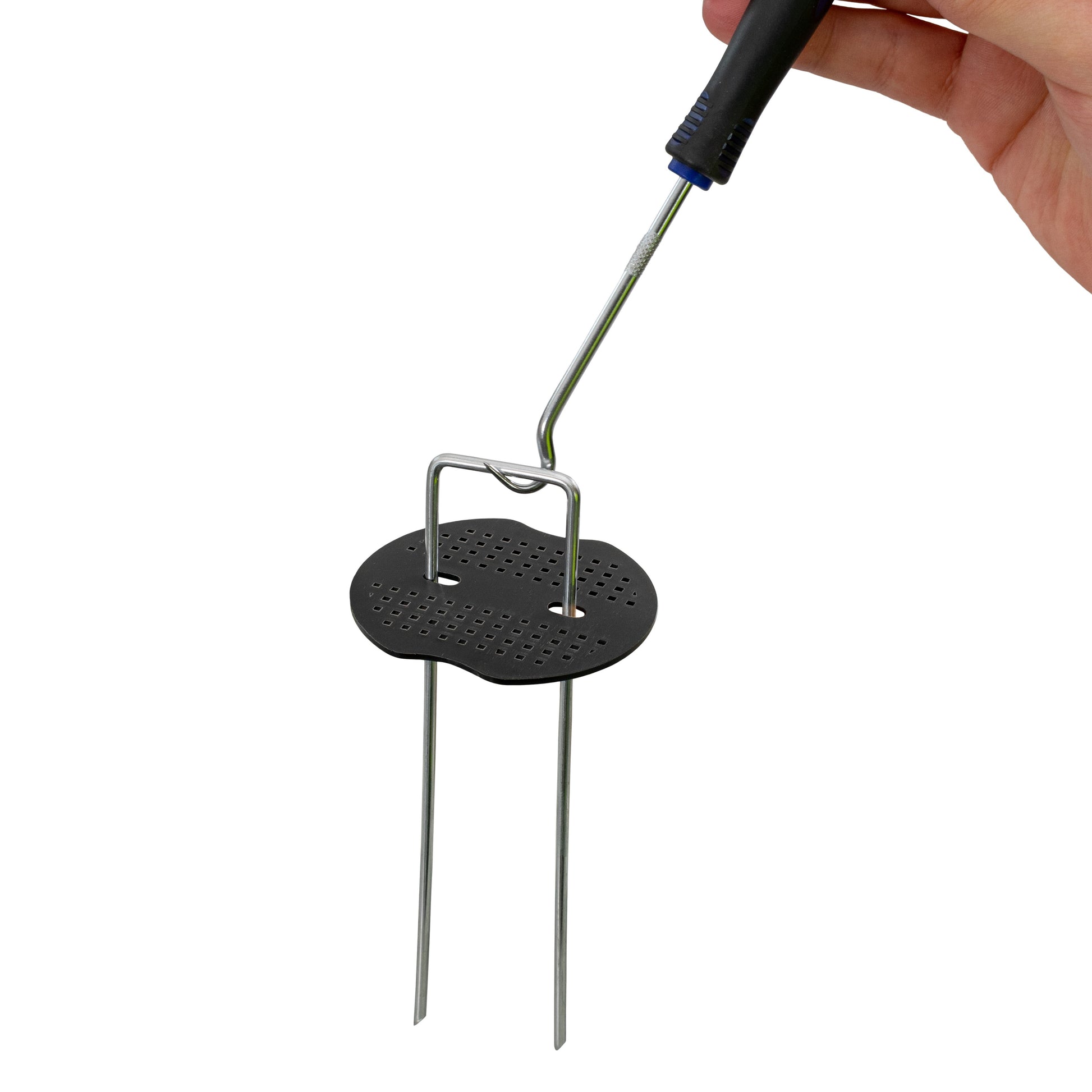Weed control membrane peg washer—perforated black disc with two metal legs