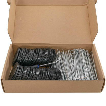 Open box showing black plastic peg washers and silver metal stakes