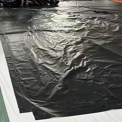 Black PVC pond liner, square sheet with creases and welded seams
